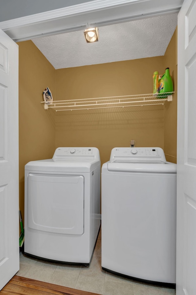 1545 Carthage Hwy, Lebanon, TN 37087 - laundry area featuring independent washer and dryer and light tile patterned floors