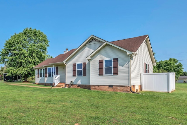 1545 Carthage Hwy, Lebanon, TN 37087 - view of front facade featuring crawl space, a front yard, and a shingled roof