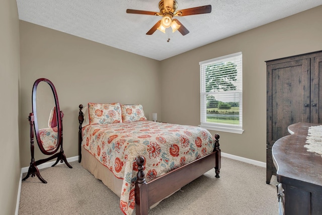 1545 Carthage Hwy, Lebanon, TN 37087 - bedroom featuring light carpet, baseboards, a textured ceiling, and a ceiling fan