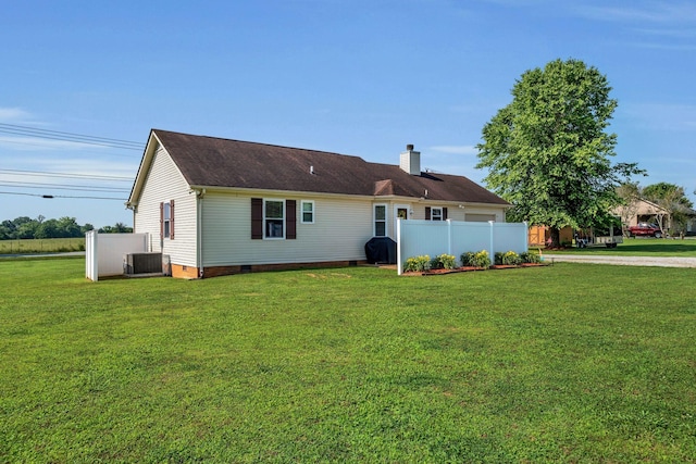 1545 Carthage Hwy, Lebanon, TN 37087 - rear view of house with crawl space, central AC unit, a chimney, driveway, and roof with shingles