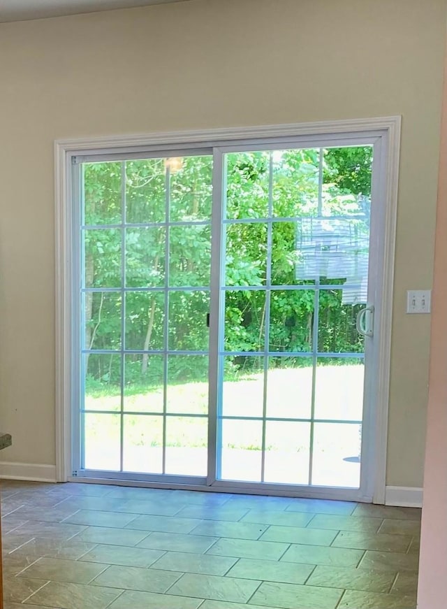 507 Whirlaway Ct, Burns, TN 37029 - doorway to outside featuring baseboards