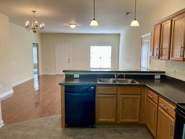 507 Whirlaway Ct, Burns, TN 37029 - kitchen featuring dishwasher, a peninsula, dark countertops, and open floor plan
