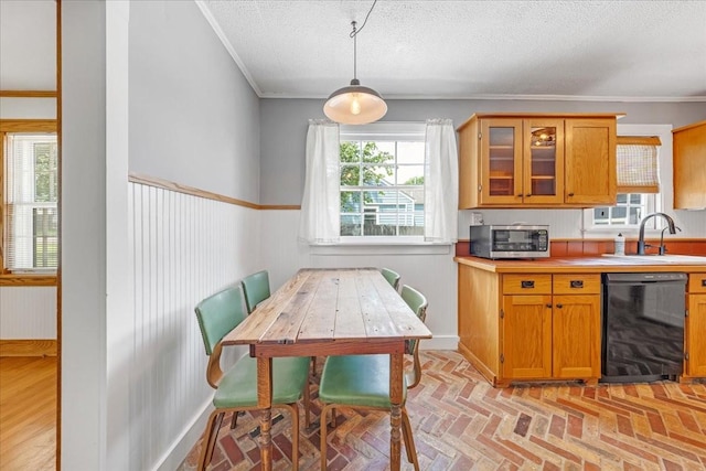 256 Tanksley Ave, Nashville, TN 37211 - kitchen with dishwasher, a sink, ornamental molding, brown cabinets, and glass insert cabinets