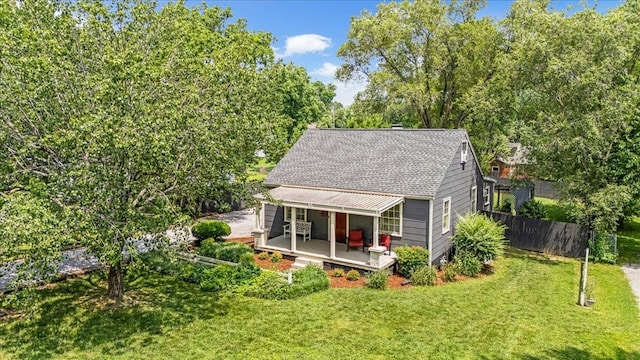 256 Tanksley Ave, Nashville, TN 37211 - back of property featuring roof with shingles, covered porch, and view of scattered trees