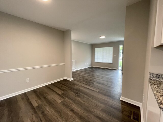 1004 E Railroad St, Waverly, TN 37185 - unfurnished room with dark wood-type flooring, baseboards, and recessed lighting
