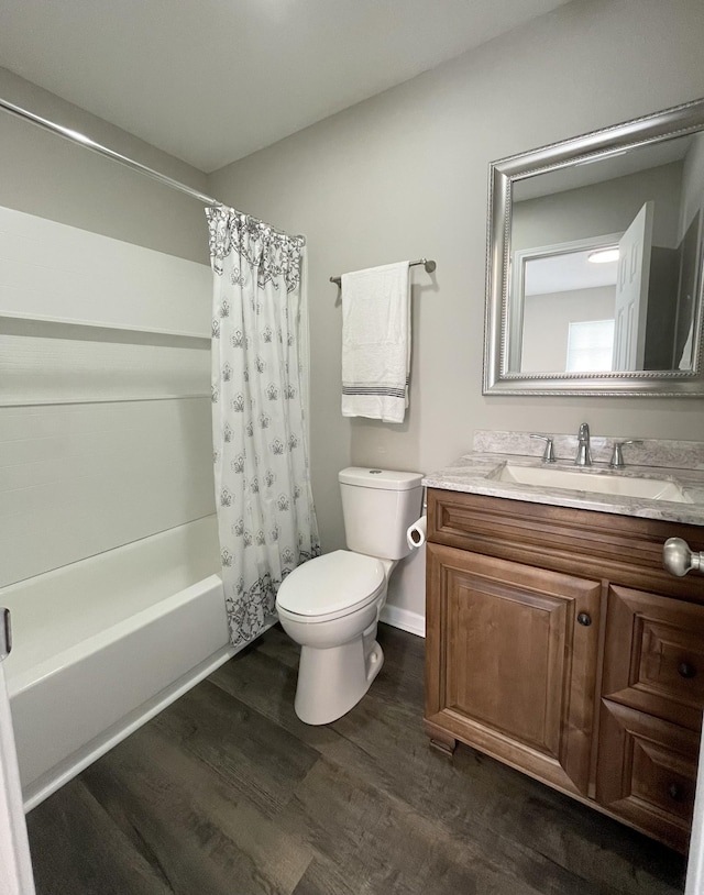 1004 E Railroad St, Waverly, TN 37185 - full bath featuring toilet, shower / bath combination with curtain, vanity, and wood finished floors