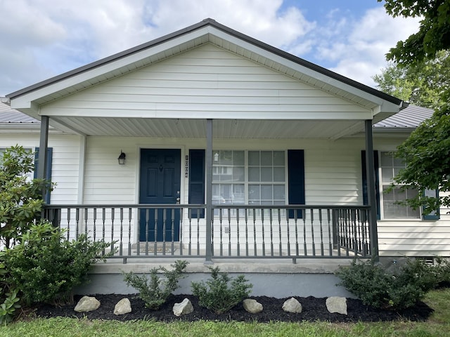 1004 E Railroad St, Waverly, TN 37185 - view of front of house featuring a porch and metal roof