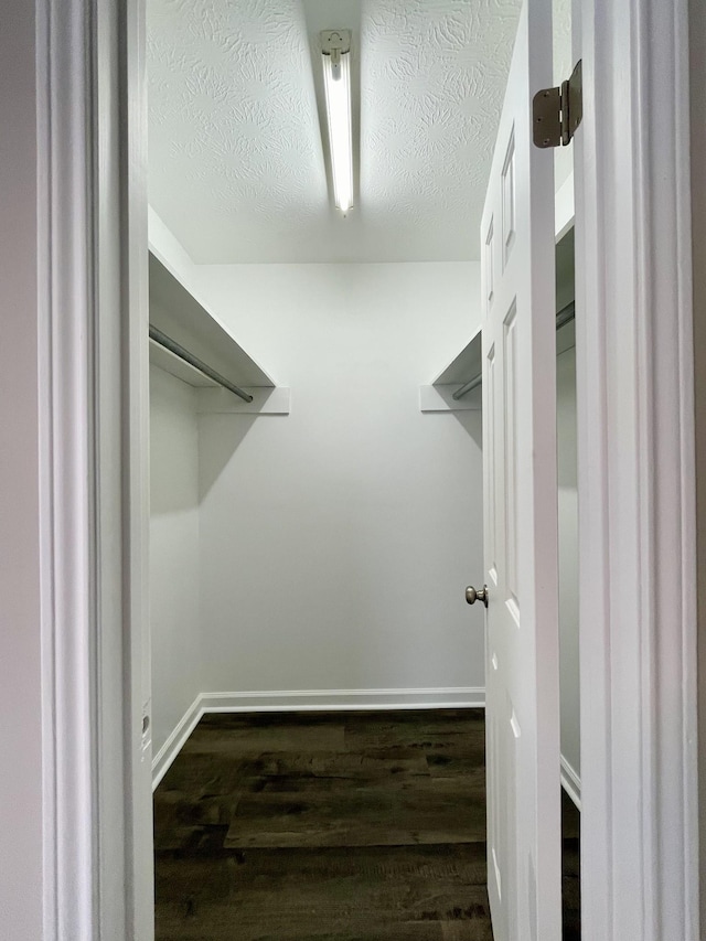 1004 E Railroad St, Waverly, TN 37185 - walk in closet featuring dark wood finished floors
