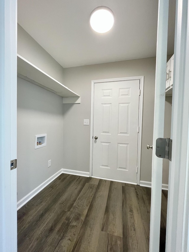 1004 E Railroad St, Waverly, TN 37185 - laundry area featuring washer hookup, dark wood finished floors, and baseboards