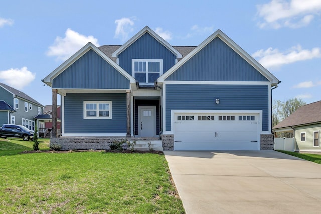 1038 Camden Trl, Greenbrier, TN 37073 - craftsman-style house with board and batten siding, a front yard, an attached garage, and concrete driveway