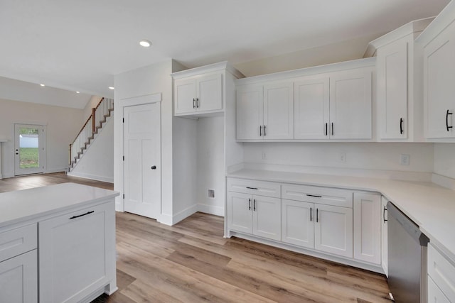 1038 Camden Trl, Greenbrier, TN 37073 - kitchen featuring dishwasher, white cabinets, light countertops, light wood-style floors, and recessed lighting