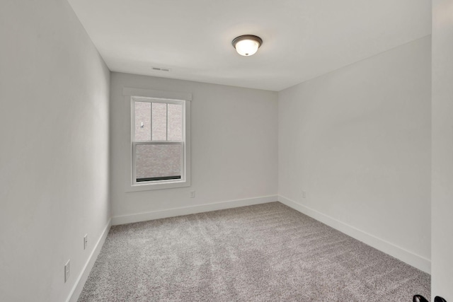 1038 Camden Trl, Greenbrier, TN 37073 - spare room featuring carpet flooring and baseboards