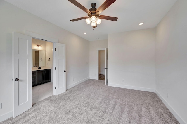1038 Camden Trl, Greenbrier, TN 37073 - unfurnished bedroom featuring light colored carpet, baseboards, recessed lighting, ensuite bathroom, and a ceiling fan