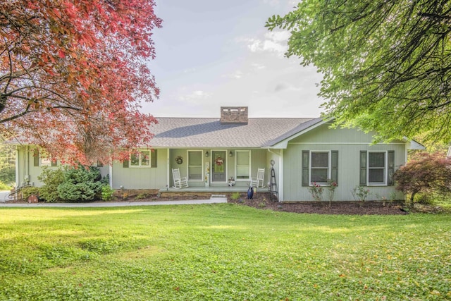 813 Stiner Ln, La Follette, TN 37766 - single story home featuring covered porch, a chimney, a front lawn, and a shingled roof