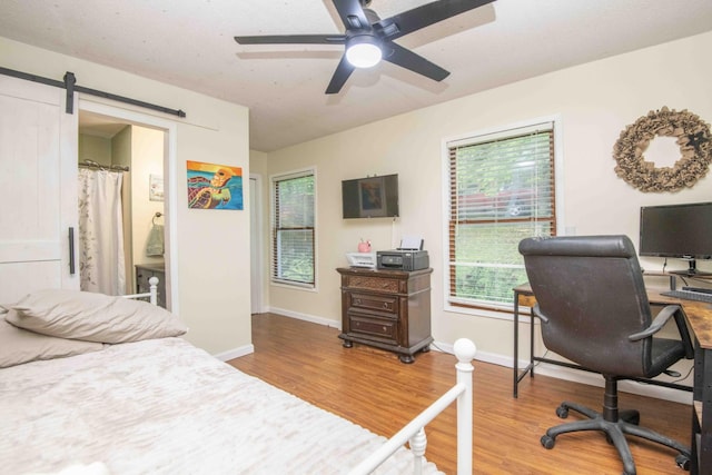 813 Stiner Ln, La Follette, TN 37766 - bedroom featuring light wood-style flooring, baseboards, a desk, and ceiling fan