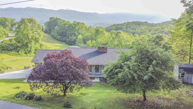 813 Stiner Ln, La Follette, TN 37766 - view of mountain backdrop with a forest