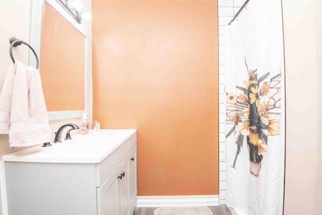 813 Stiner Ln, La Follette, TN 37766 - bathroom featuring vanity, a shower with curtain, and baseboards