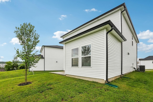 4232 Skyridge Dr, Nashville, TN 37207 - view of side of home featuring a lawn and central AC unit