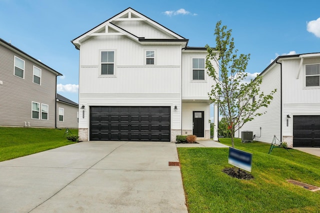 4232 Skyridge Dr, Nashville, TN 37207 - view of front facade featuring board and batten siding, an attached garage, central AC, concrete driveway, and a front lawn