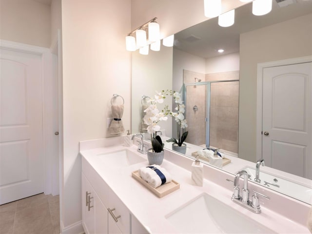 1343 Beasley Blvd, Mount Juliet, TN 37122 - bathroom with a shower stall, double vanity, and tile patterned flooring