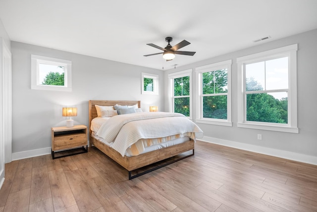 179 Deer Path Ct, Smithville, TN 37166 - bedroom featuring baseboards, light wood finished floors, and a ceiling fan