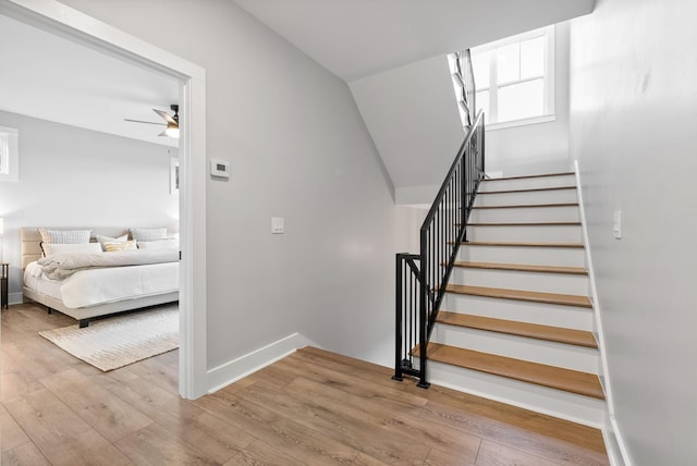 179 Deer Path Ct, Smithville, TN 37166 - stairs featuring wood finished floors, ceiling fan, and baseboards