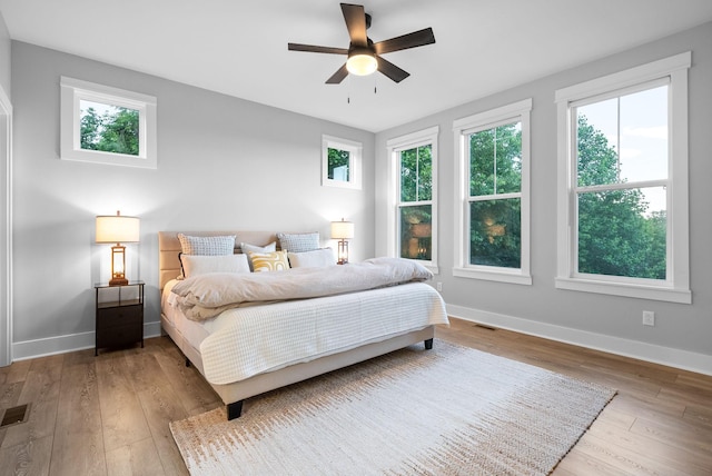 179 Deer Path Ct, Smithville, TN 37166 - bedroom featuring hardwood / wood-style floors, baseboards, and a ceiling fan