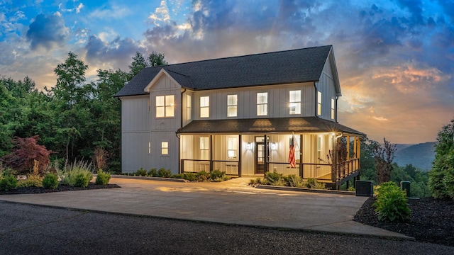 179 Deer Path Ct, Smithville, TN 37166 - modern inspired farmhouse with covered porch, a shingled roof, central AC unit, and concrete driveway