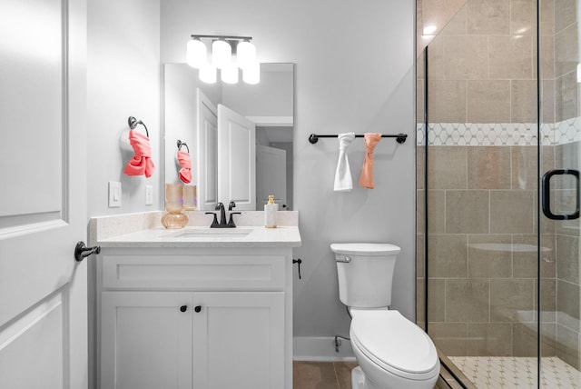 179 Deer Path Ct, Smithville, TN 37166 - bathroom featuring toilet, vanity, a stall shower, tile patterned floors, and baseboards