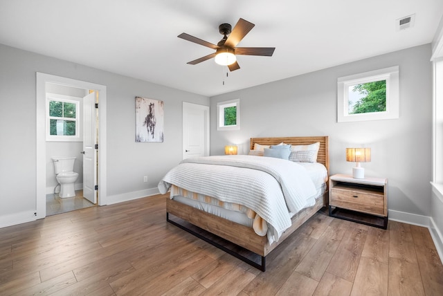 179 Deer Path Ct, Smithville, TN 37166 - bedroom featuring multiple windows, baseboards, and light wood-type flooring
