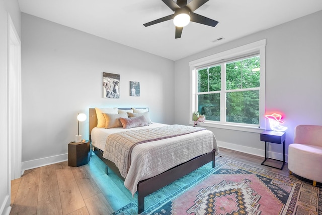 179 Deer Path Ct, Smithville, TN 37166 - bedroom featuring hardwood / wood-style flooring, baseboards, and ceiling fan