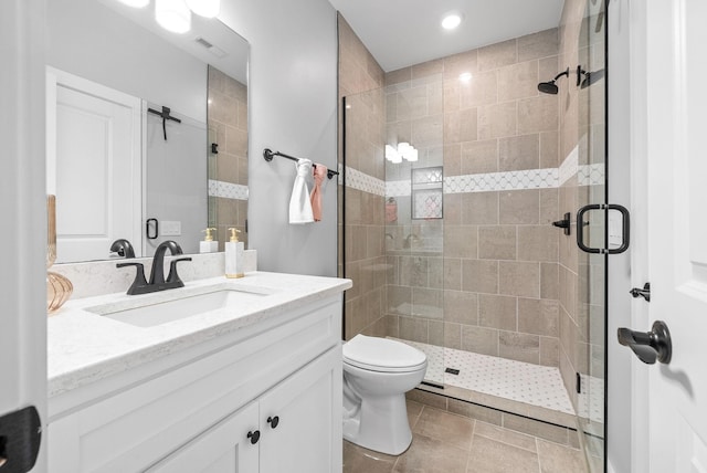 179 Deer Path Ct, Smithville, TN 37166 - full bath with vanity, a stall shower, toilet, and recessed lighting
