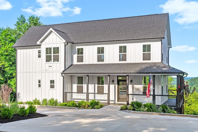 179 Deer Path Ct, Smithville, TN 37166 - modern farmhouse style home with a porch, board and batten siding, and a shingled roof