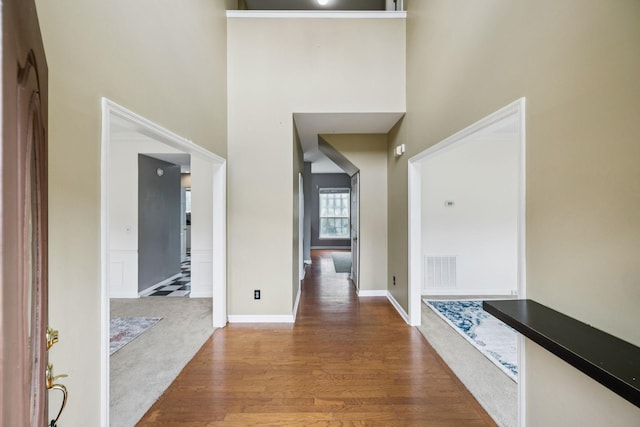 205 Caneel Cv, Hermitage, TN 37076 - entryway with wood finished floors, a high ceiling, and baseboards