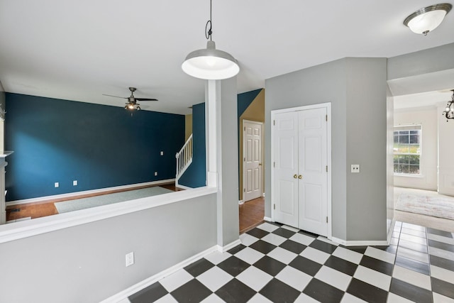 205 Caneel Cv, Hermitage, TN 37076 - spare room featuring tile patterned floors, a ceiling fan, baseboards, and stairway
