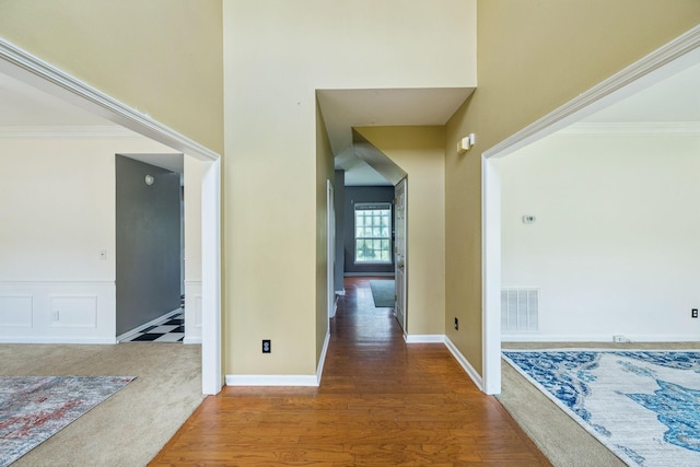 205 Caneel Cv, Hermitage, TN 37076 - corridor featuring wood finished floors, a high ceiling, and ornamental molding