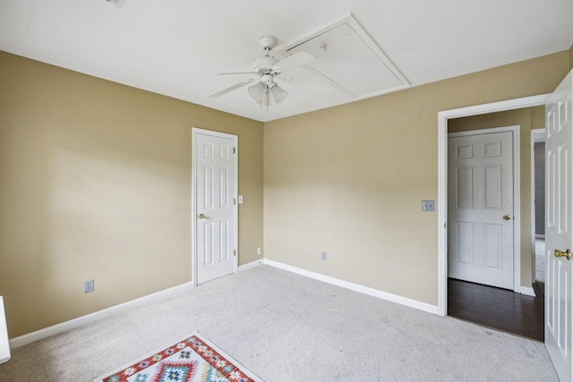 205 Caneel Cv, Hermitage, TN 37076 - spare room featuring ceiling fan, carpet flooring, baseboards, and attic access