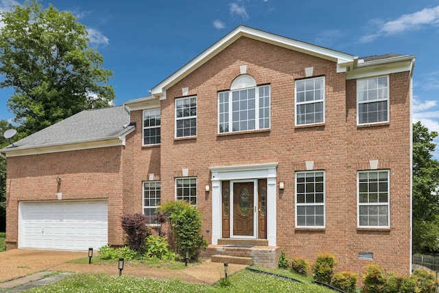 205 Caneel Cv, Hermitage, TN 37076 - view of front of home with brick siding, concrete driveway, and a garage