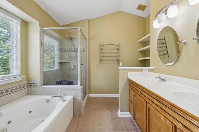 205 Caneel Cv, Hermitage, TN 37076 - bathroom with a shower stall, a tub with jets, plenty of natural light, double vanity, and vaulted ceiling