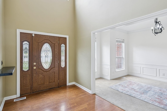 205 Caneel Cv, Hermitage, TN 37076 - foyer with plenty of natural light, wood finished floors, a chandelier, and a towering ceiling