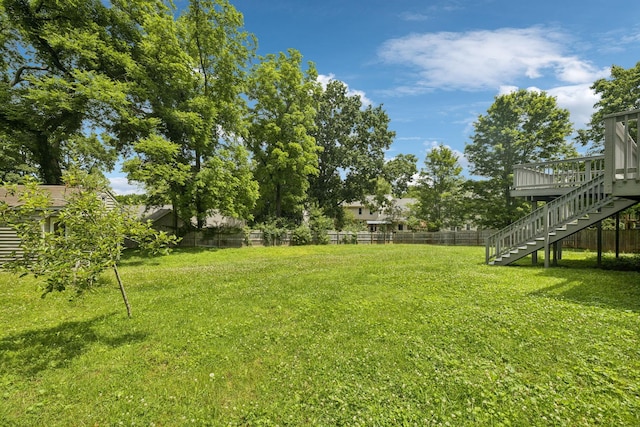 205 Caneel Cv, Hermitage, TN 37076 - view of yard featuring stairway and a wooden deck