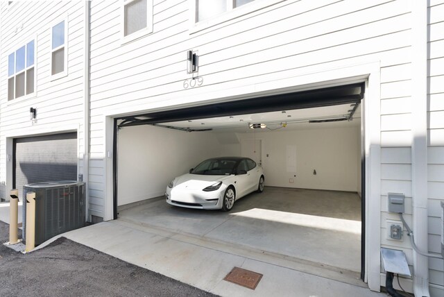 621 Live Life Ln, Nashville, TN 37207 - garage featuring cooling unit and driveway