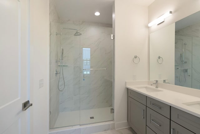 621 Live Life Ln, Nashville, TN 37207 - full bath featuring a marble finish shower, double vanity, marble finish floors, recessed lighting, and baseboards