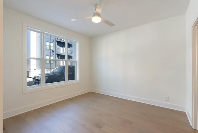 621 Live Life Ln, Nashville, TN 37207 - spare room featuring wood finished floors, baseboards, and a ceiling fan