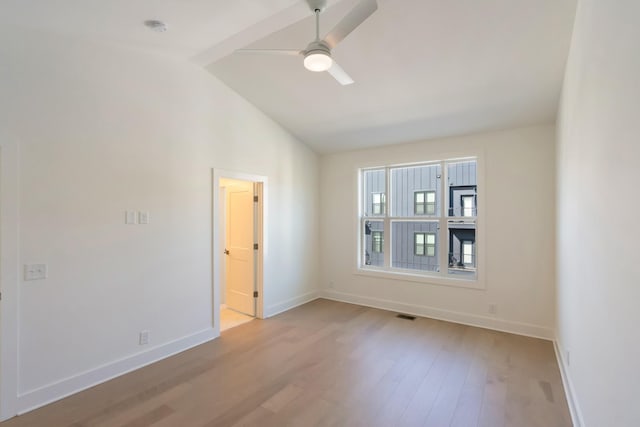 621 Live Life Ln, Nashville, TN 37207 - spare room featuring baseboards, a ceiling fan, vaulted ceiling, light wood-type flooring, and a smoke detector