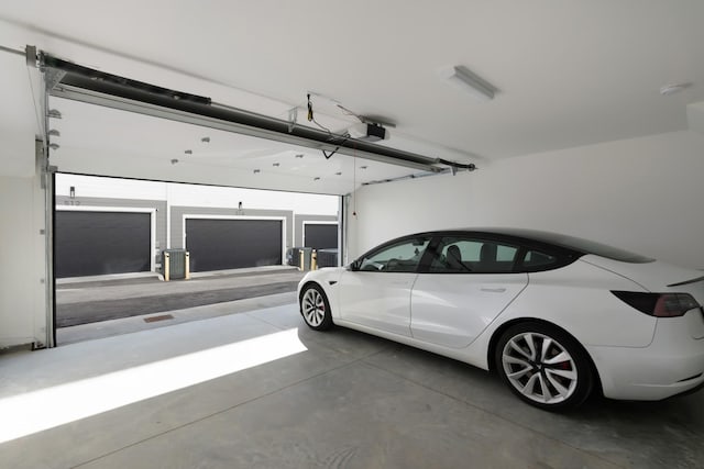 621 Live Life Ln, Nashville, TN 37207 - garage featuring a garage door opener