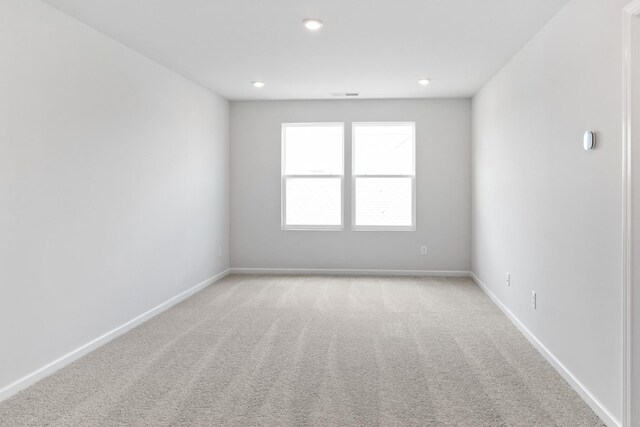 276 Subban Ct, Lebanon, TN 37087 - spare room with light colored carpet, baseboards, and recessed lighting
