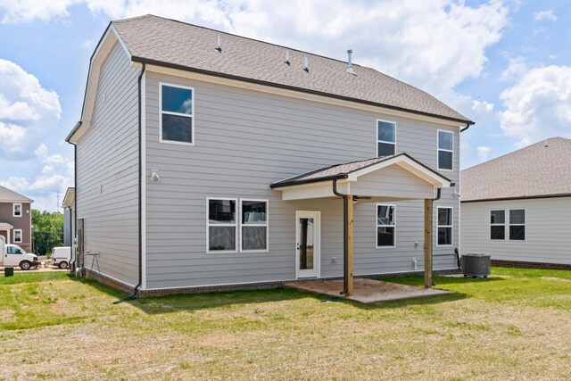 276 Subban Ct, Lebanon, TN 37087 - rear view of house with central AC unit, a patio area, and a lawn