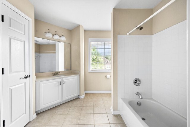 8825 Caswick Ct, Nolensville, TN 37135 - bathroom with tile patterned floors, vanity, washtub / shower combination, and baseboards