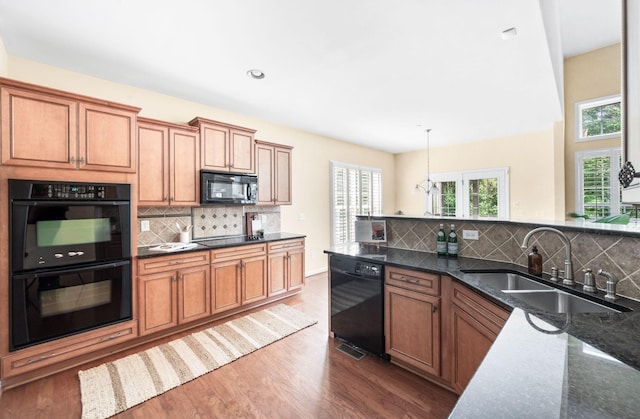 8825 Caswick Ct, Nolensville, TN 37135 - kitchen featuring black appliances, a sink, dark wood finished floors, and backsplash